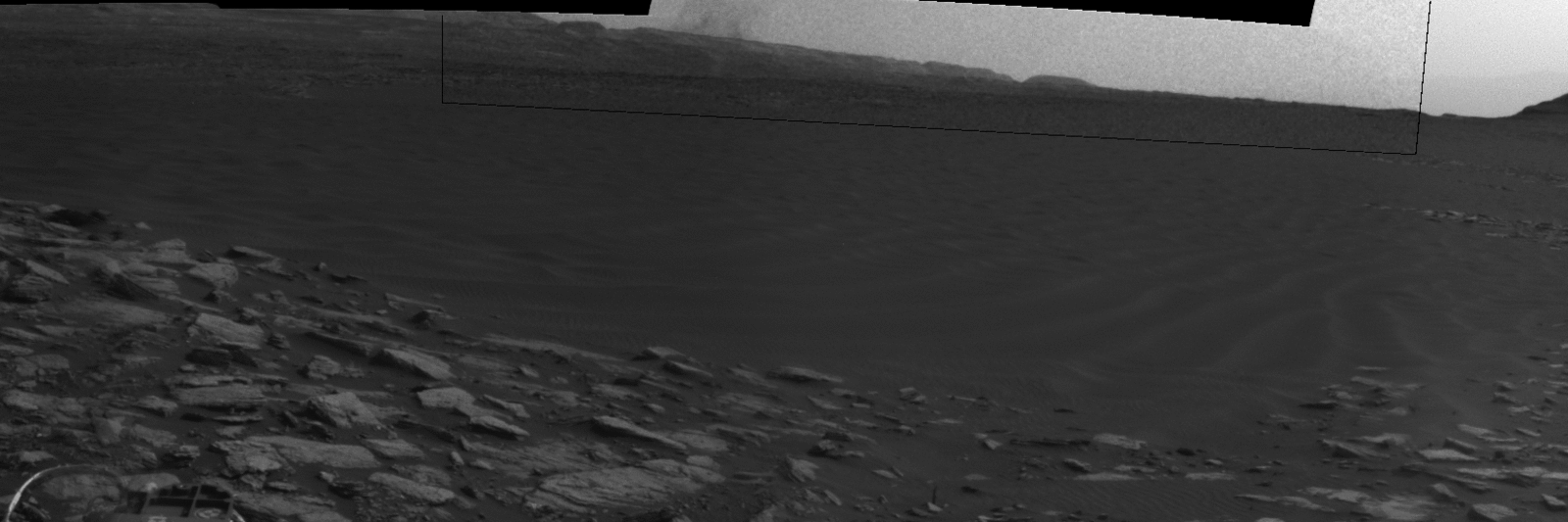Beyond a dark sand dune closer to the rover, a Martian dust devil passes in front of the horizon in this sequence of images from NASA's Curiosity Mars rover. The rover's Navigation Camera made this series of observations on Feb. 4, 2017, during the local afternoon in Mars' Gale Crater.