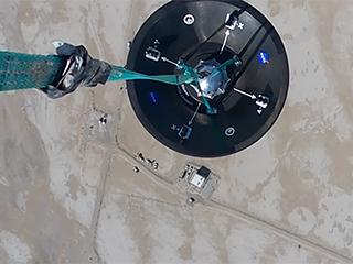 Engineers successfully completed a series of Mars Sample Return (MSR) Earth Entry System (EES) drop tests at the Utah Test and Training Range (UTTR). A Manufacturing Demonstration Unit (MDU) of one potential design for the EES aeroshell was outfitted with sensors and dropped from a helicopter.