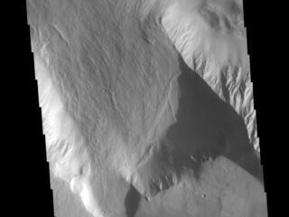 This image from NASAs Mars Odyssey shows the northern margin of Olympus Mons, the largest Martian volcano.