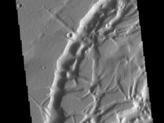 This image from NASAs Mars Odyssey shows a portion of Nilus Chaos. Located north of Kasei Vallis, this chaos formed at the elevation boundary between Kasei Valles and the surrounding plains.
