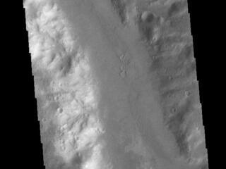 This image from NASAs Mars Odyssey shows a small section of Uzboi Vallis. This valley system arises just north of Argyre Planitia and flows northward into Holden Crater.