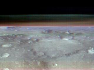 This unusual view of the horizon of Mars was captured by NASAs Odyssey orbiter using its THEMIS camera, in an operation that took engineers three months to plan.
